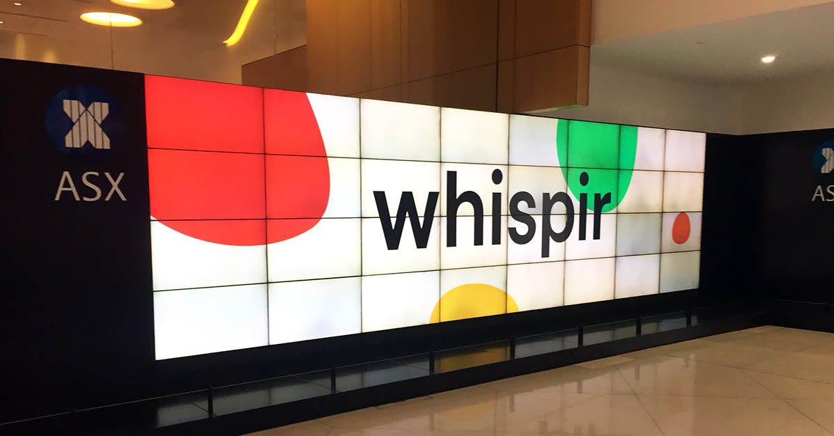 Large screen with Whispir logo and abstract colours 