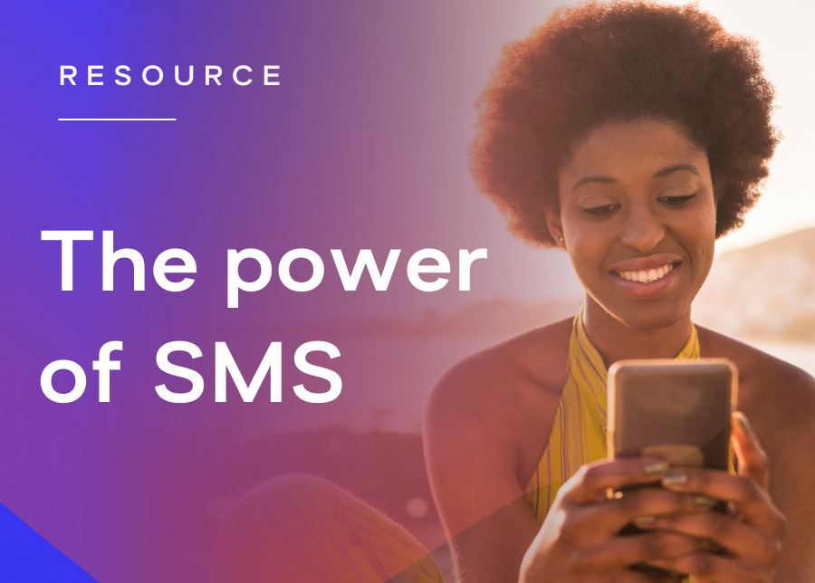 A woman looks at her cell phone and smiles next to the caption, "The power of SMS."