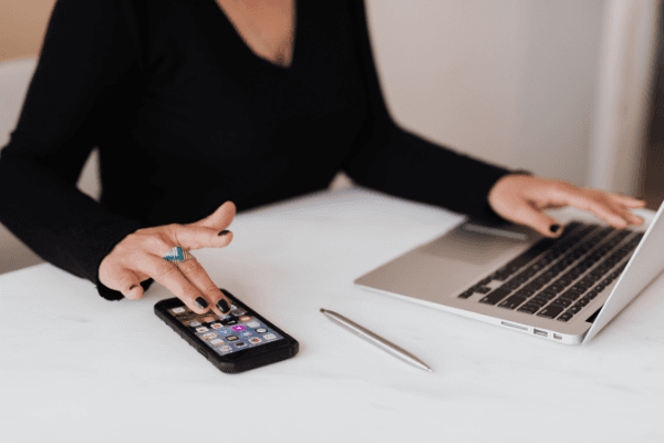A woman using smartphone and mobile